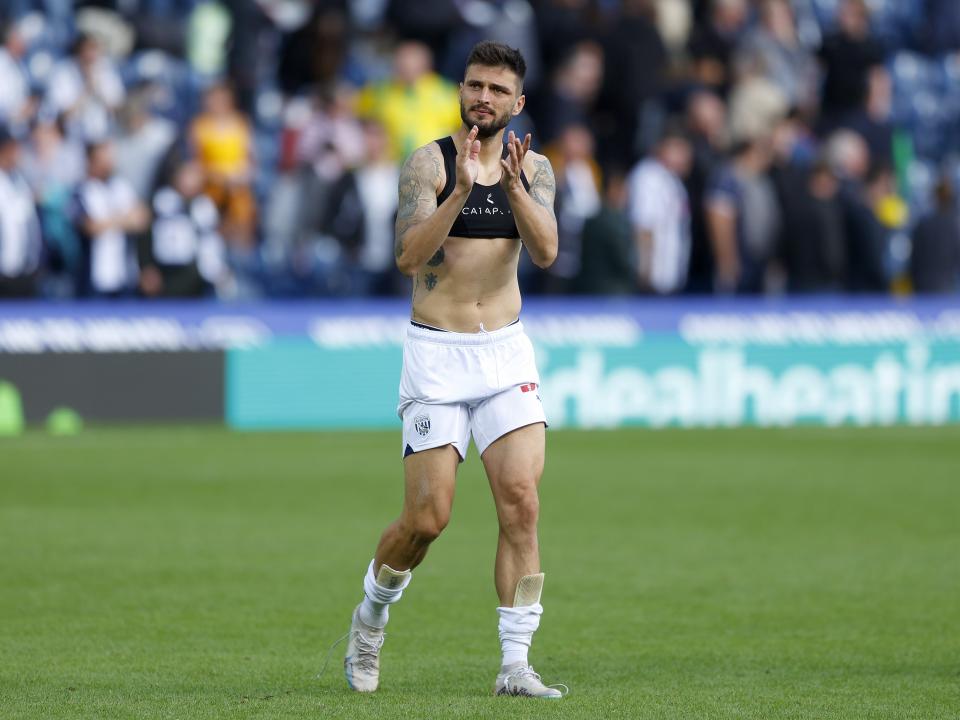 Okay Yokuslu applauds supporters after beating Middlesbrough