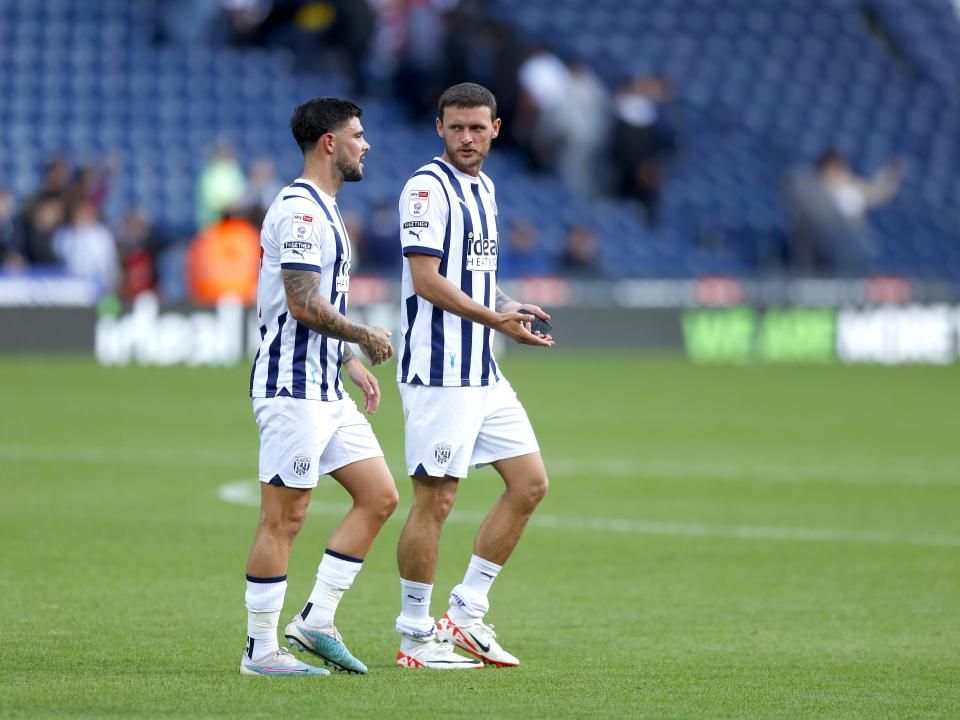 Alex Mowatt and John Swift applaud supporters after beating Middlesbrough