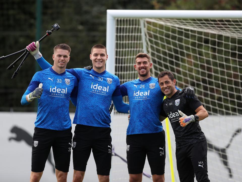 Albion's goalkeepers Ted Cann, Josh Griffiths, Alex Palmer and coach Marcos Abad pose for a photo