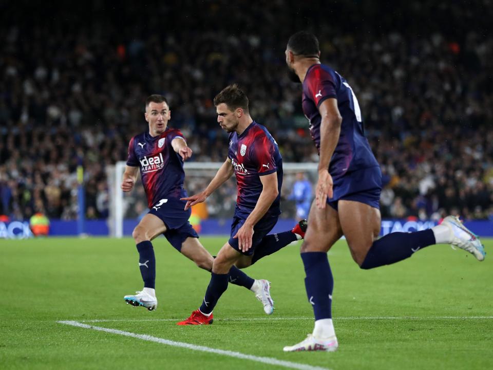 Jayson Molumby celebrates Albion's goal at Leeds