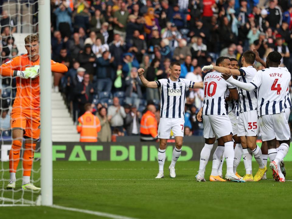 Albion players celebrate their second goal against Swansea 