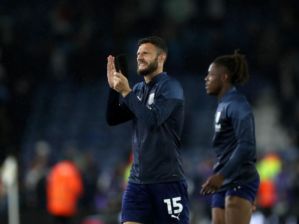 Erik Pieters applauds the away fans at Elland Road