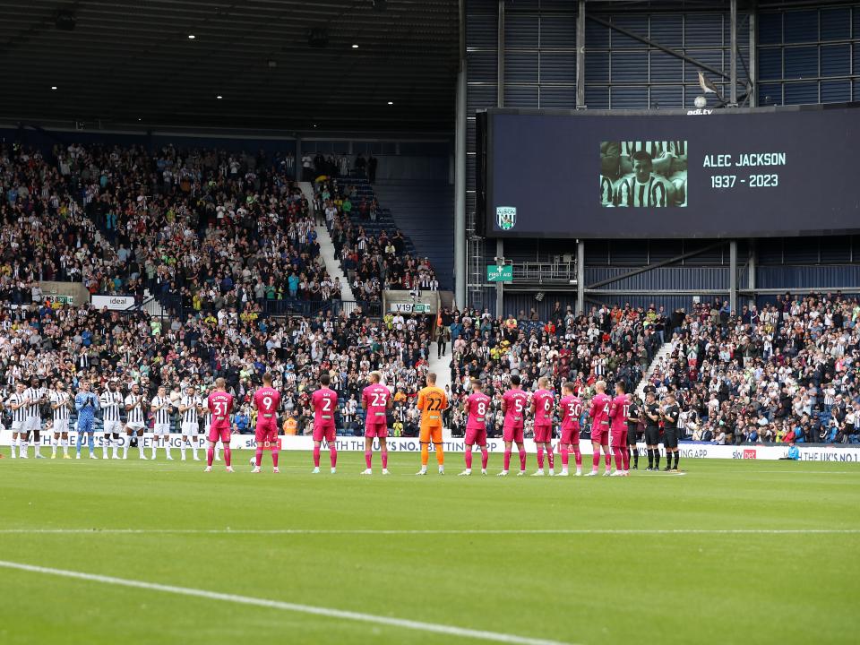 Albion and Swansea players applaud Alec Jackson during a minute's applause at The Hawthorns 