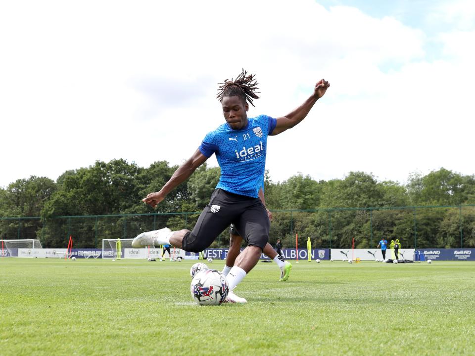 Brandon Thomas-Asante strikes the ball in training 