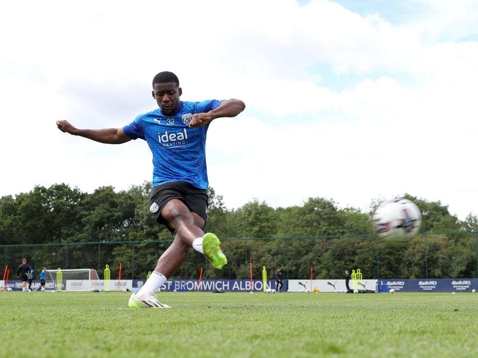 Jovan Malcolm strikes the ball in training 