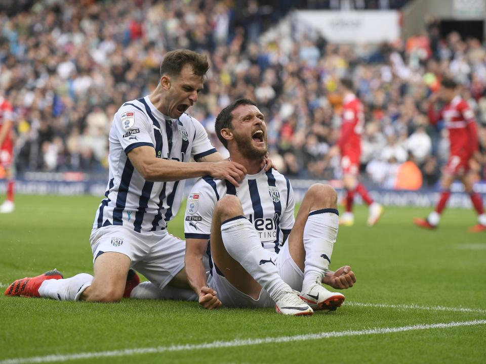 John Swift celebrates his goal against Middlesbrough with Jayson Molumby