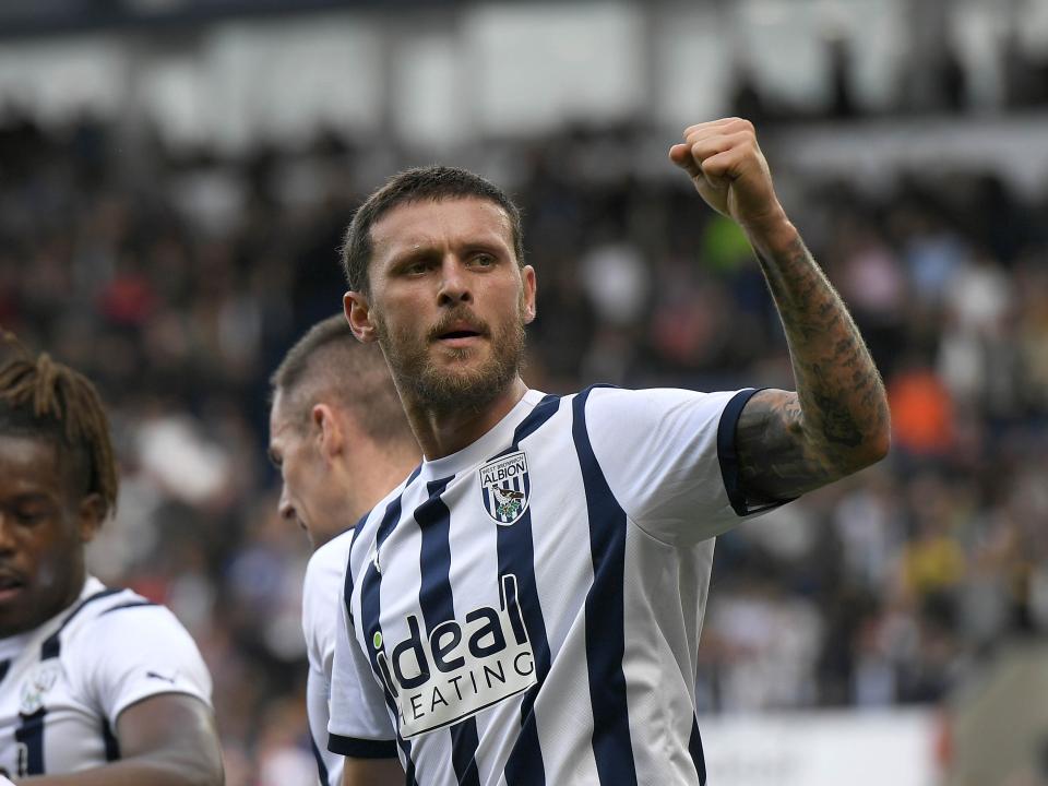 John Swift punches the air as he celebrates scoring against Middlesbrough