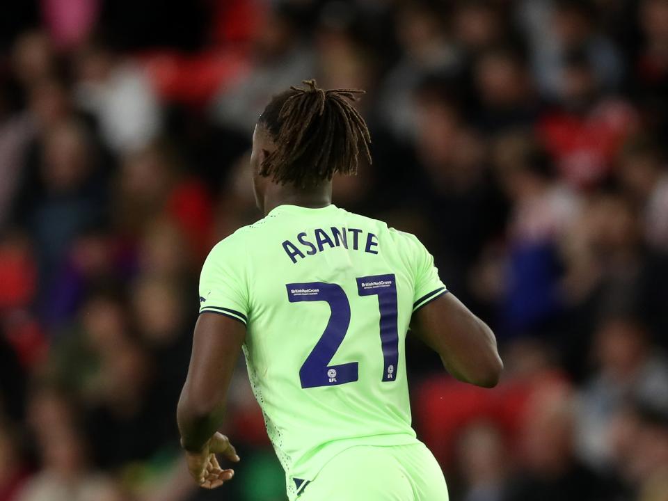 The back of Brandon Thomas-Asante's shirt with the number 21