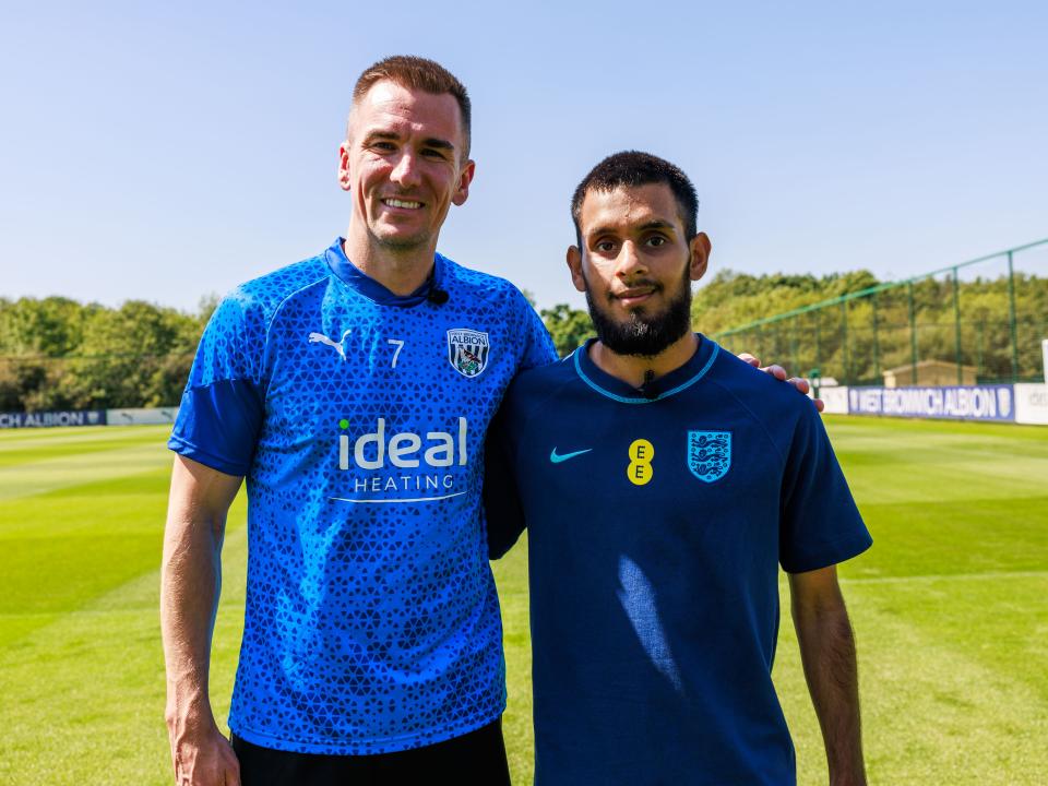 Jed Wallace in WBA training kit with Eesa Amjid in England training kit