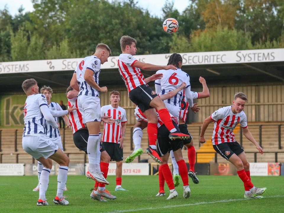 A photo of Layton Love heading the ball in Albion's Pl2 match v Sunderland