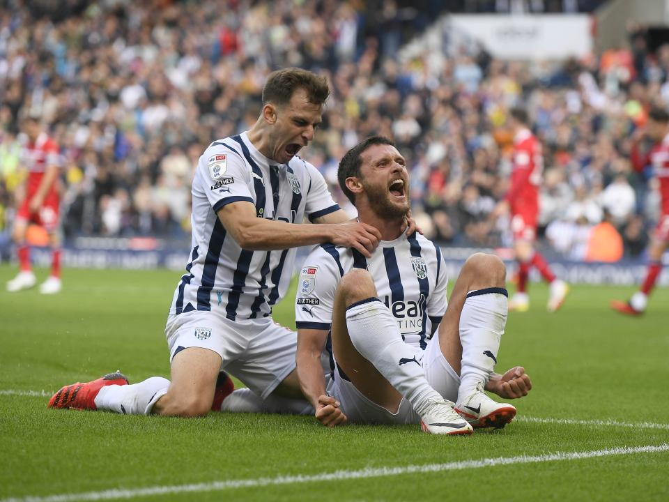 An image of John Swift and Jayson Molumby celebrating