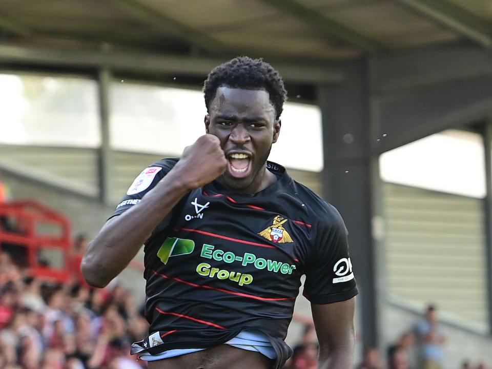 Mo Faal celebrates scoring for Doncaster Rovers