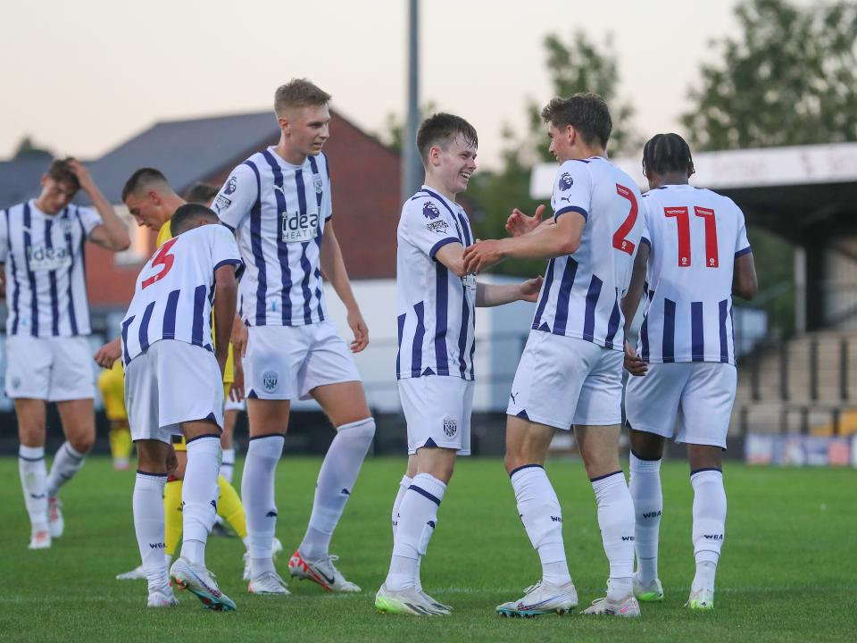 Fenton Heard celebrates scoring, in home colours.