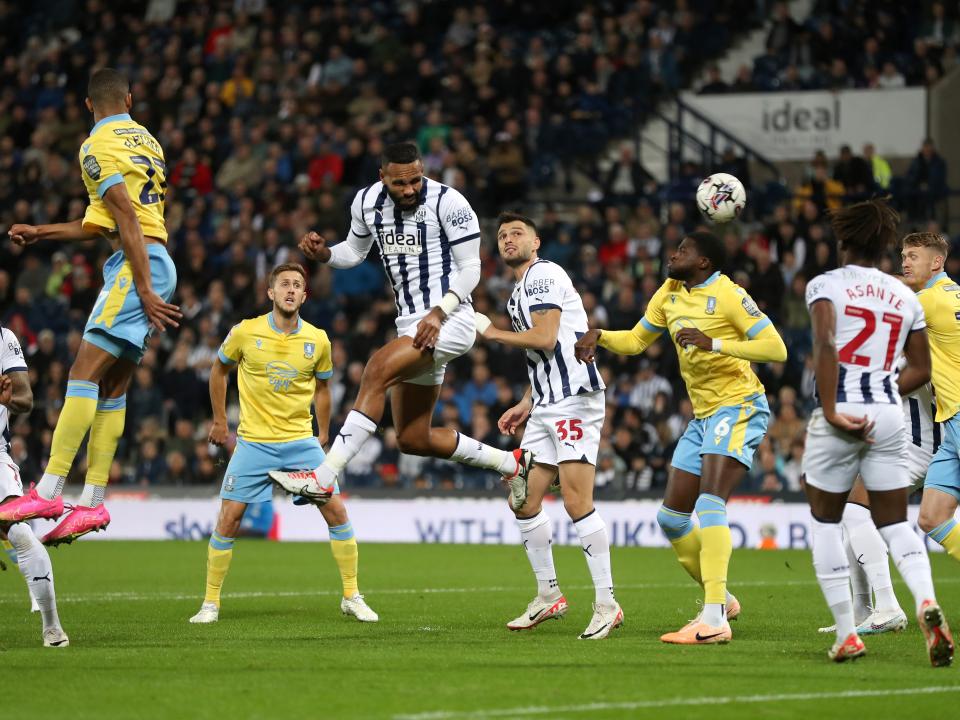 Kyle Bartley heading the ball from an attacking corner against Sheffield Wednesday