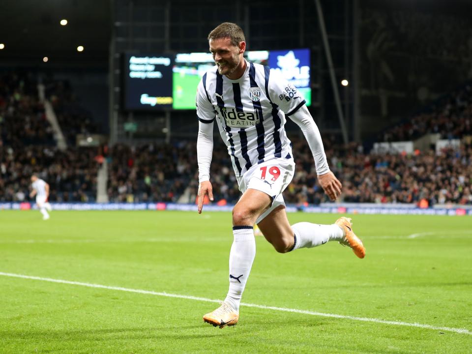 John Swift celebrates scoring against Sheffield Wednesday