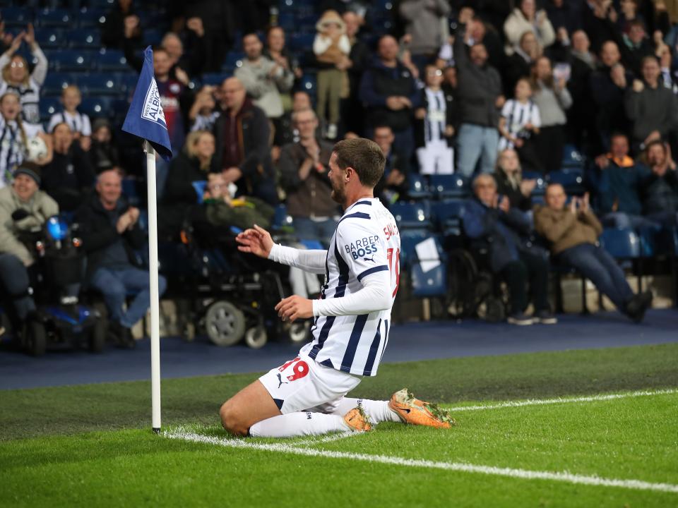 John Swift celebrates scoring against Sheffield Wednesday