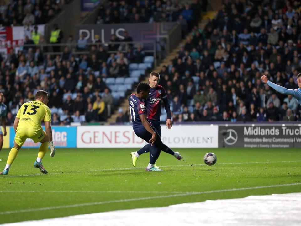 Grady Diangana slots the ball into the net against Coventry