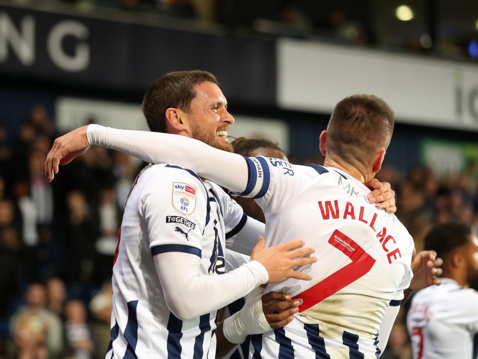 John Swift celebrates scoring against Sheffield Wednesday with Jed Wallace