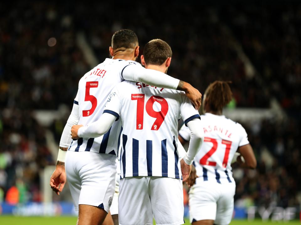 John Swift celebrates scoring against Sheffield Wednesday with Kyle Bartley