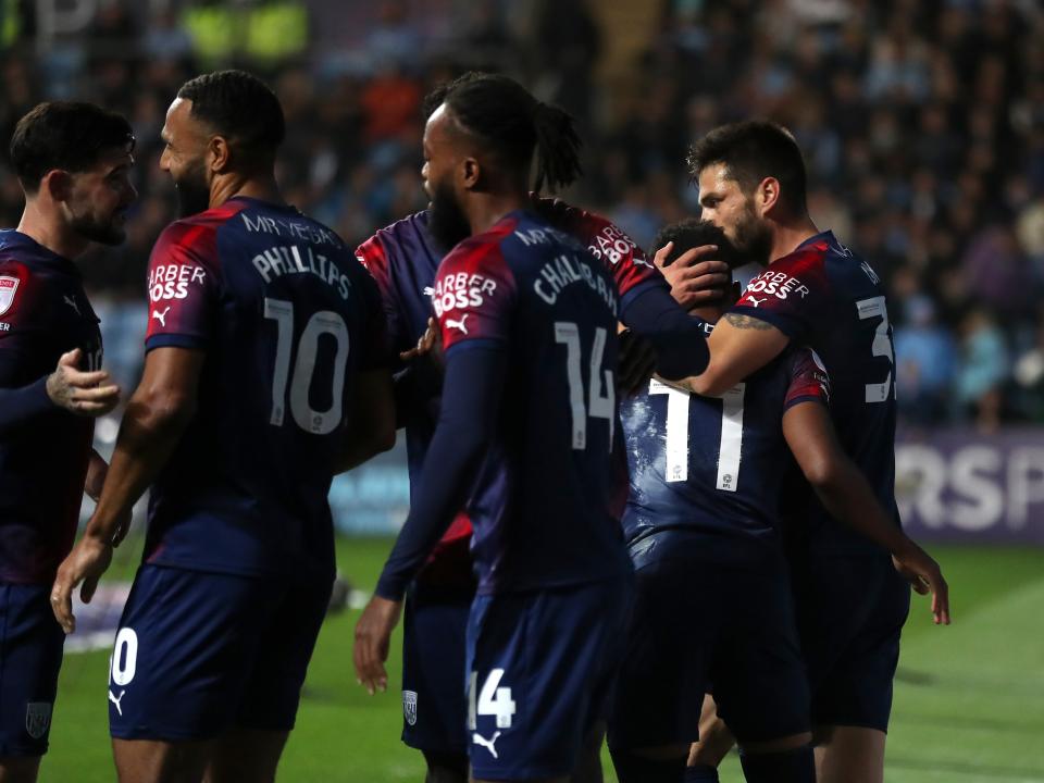 Albion players celebrate the first goal against Coventry