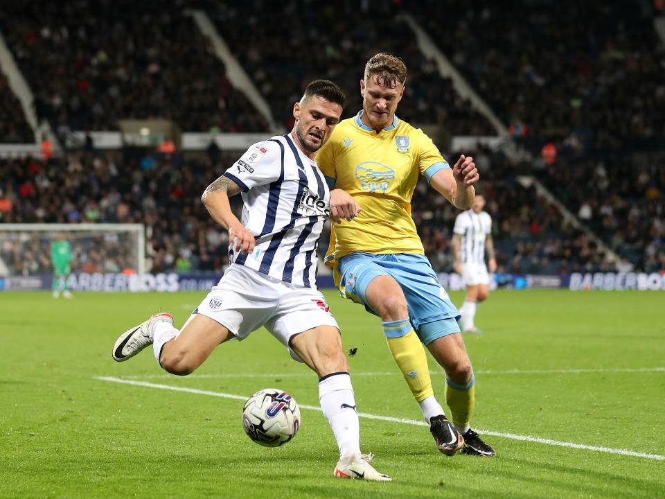 Okay Yokuslu on the ball against Sheffield Wednesday 