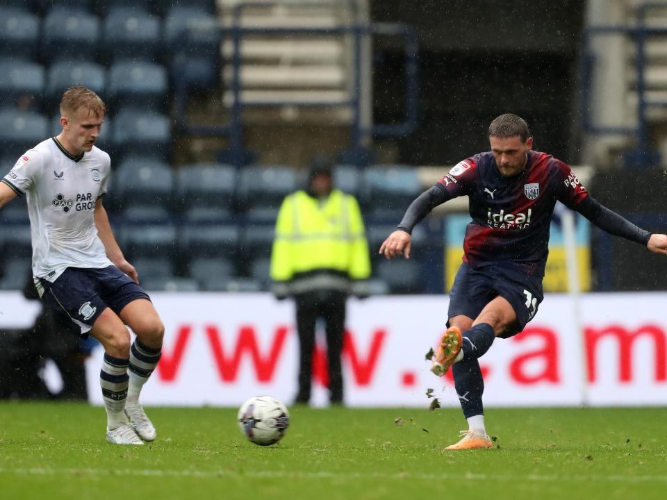John Swift plays a pass against Preston