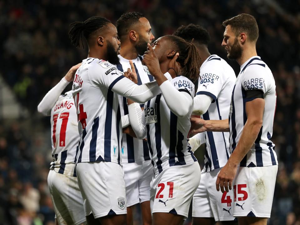 Brandon Thomas-Asante celebrates scoring against QPR with his team-mates