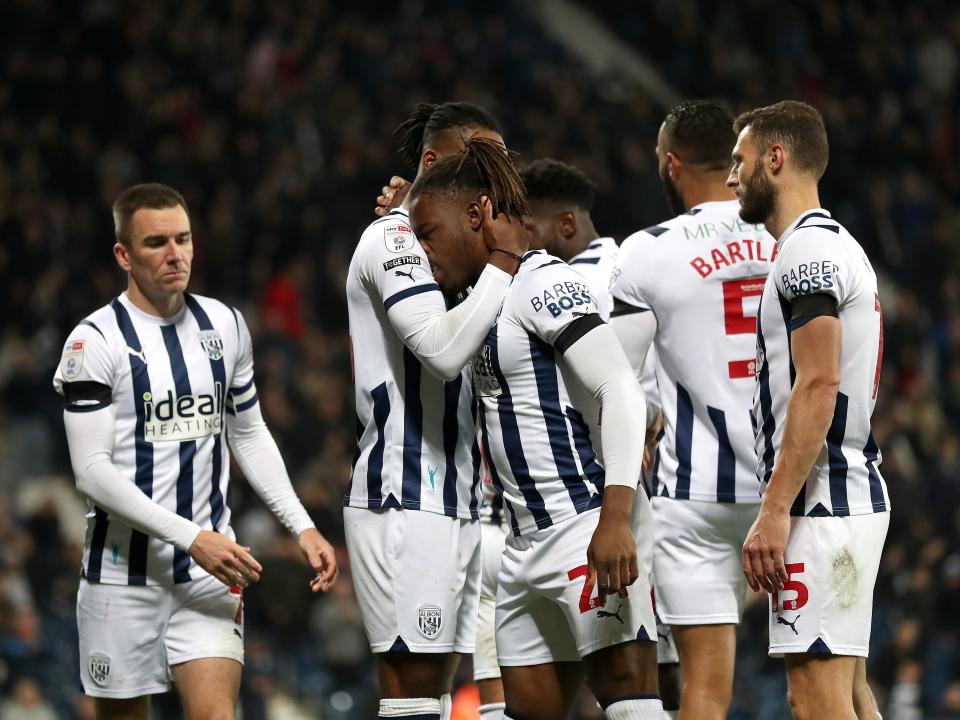 Brandon Thomas-Asante celebrates scoring against QPR with his team-mates