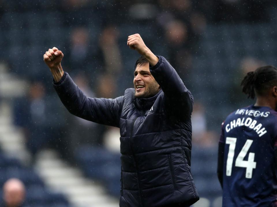 Okay Yokuslu celebrates at full time 