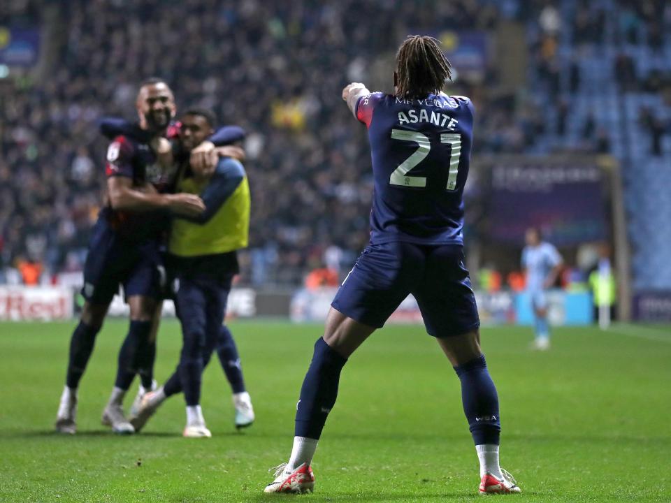 Brandon Thomas-Asante celebrates scoring against Coventry City with his team-mates
