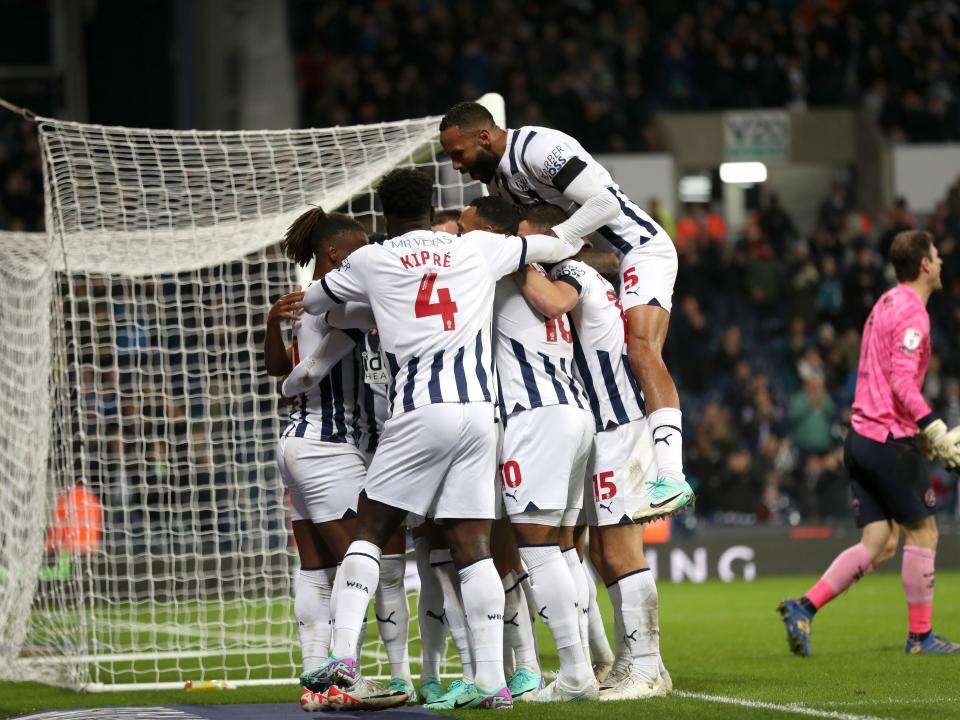 Grady Diangana celebrates scoring against QPR with his team-mates