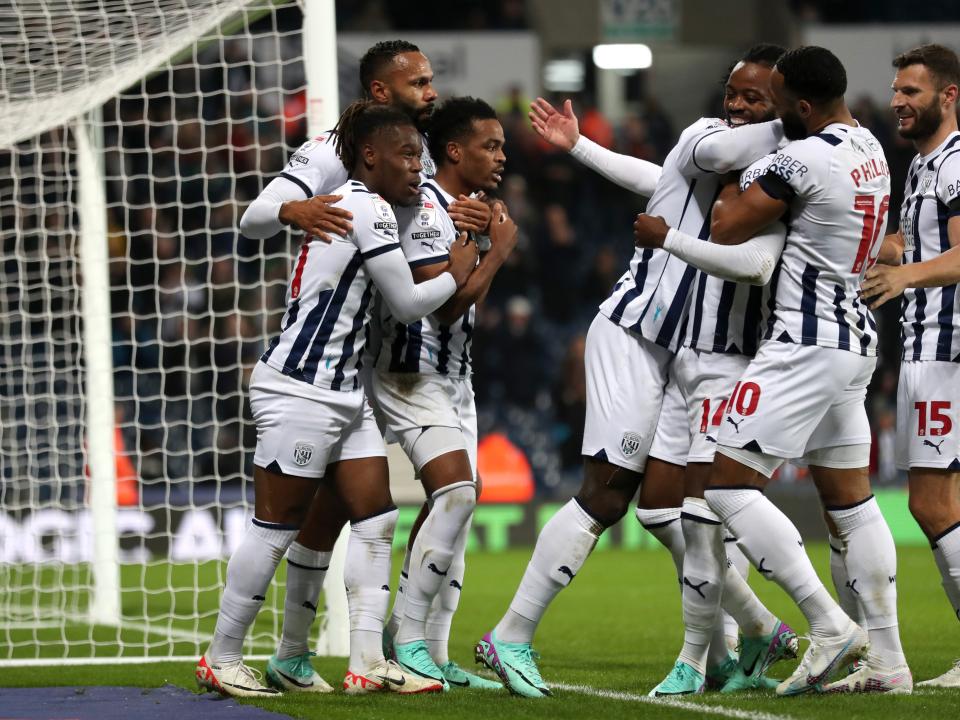 Grady Diangana celebrates scoring against QPR with his team-mates