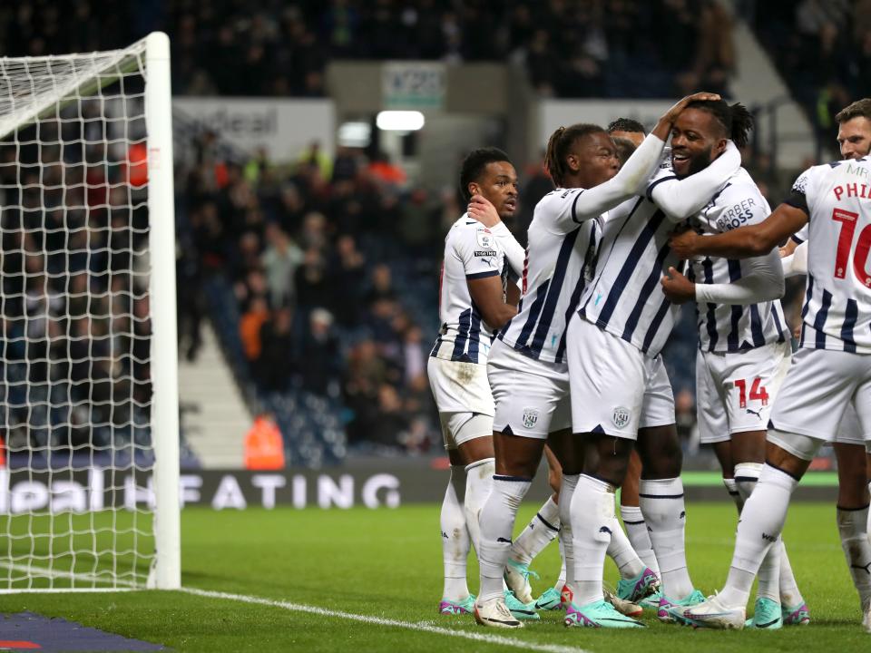 Grady Diangana celebrates scoring against QPR with his team-mates