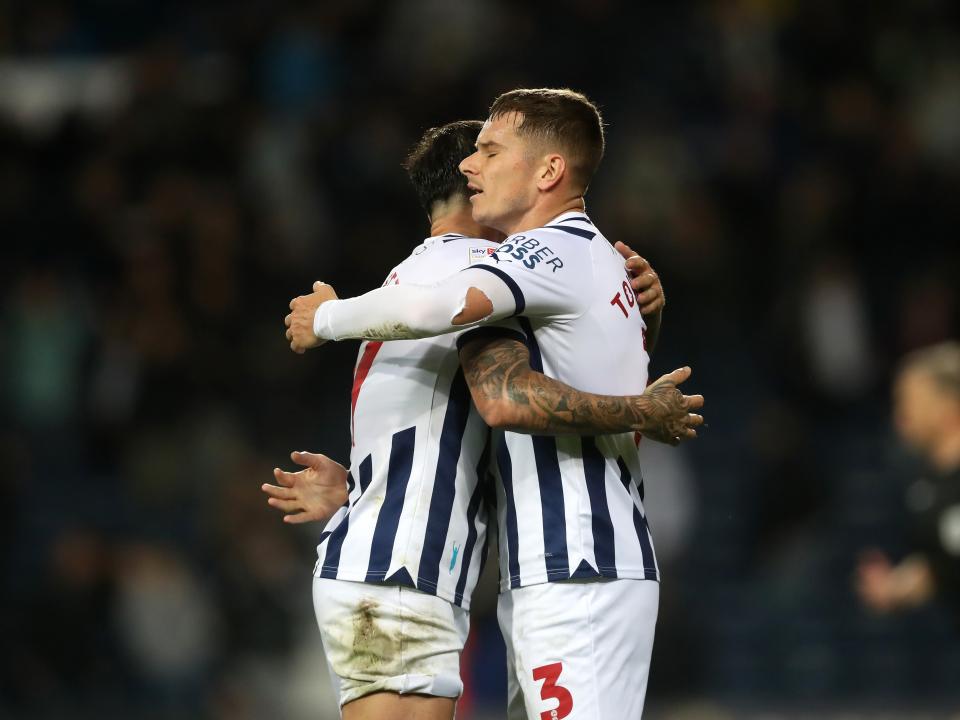 Conor Townsend and Alex Mowatt celebrate victory after the final whistle