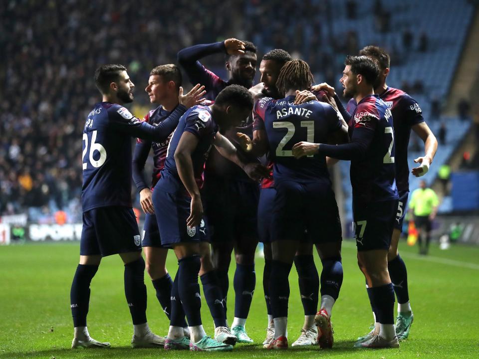 Brandon Thomas-Asante celebrates scoring against Coventry City with his team-mates