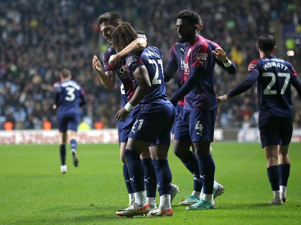 Brandon Thomas-Asante celebrates scoring against Coventry City with his team-mates