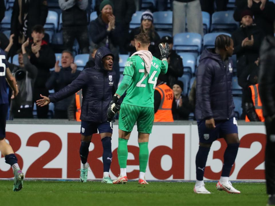 Alex Palmer and Grady Diangana celebrate winning at full-time