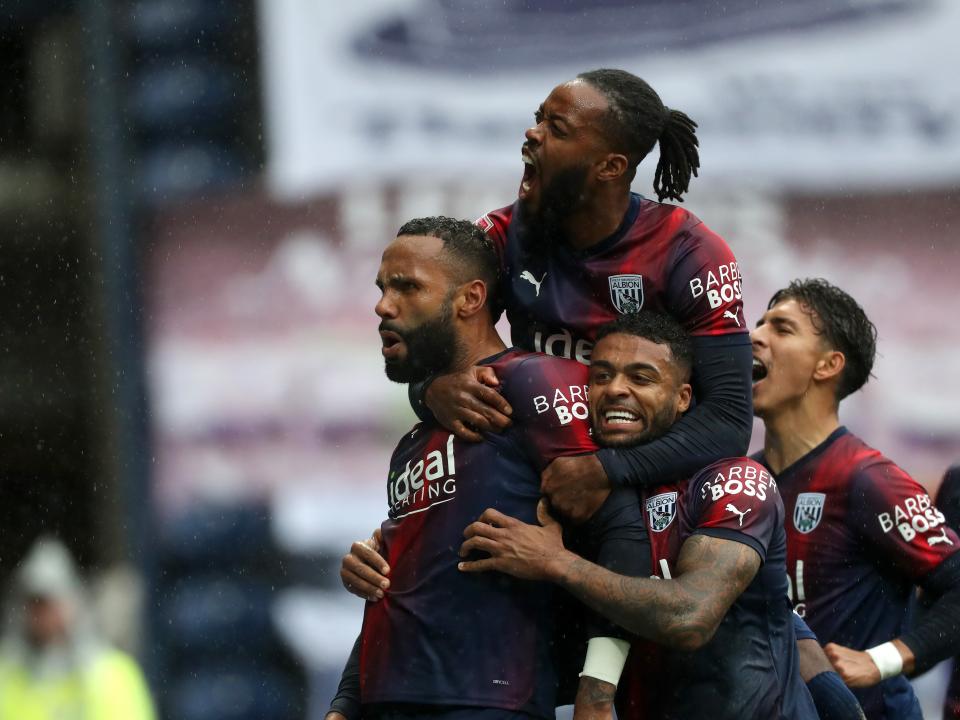 Kyle Bartley celebrates scoring against Preston with his team-mates