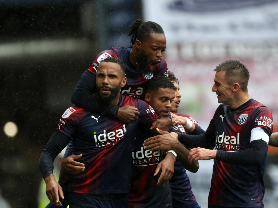 Kyle Bartley celebrates scoring against Preston with his team-mates