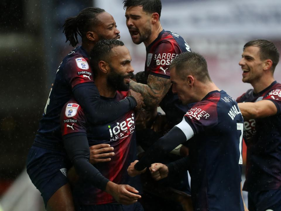 Kyle Bartley celebrates scoring against Preston with his team-mates
