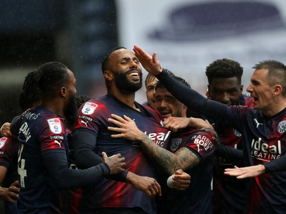 Kyle Bartley celebrates scoring against Preston with his team-mates