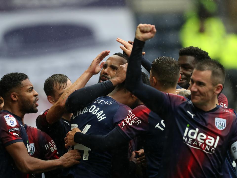 Kyle Bartley celebrates scoring against Preston with his team-mates