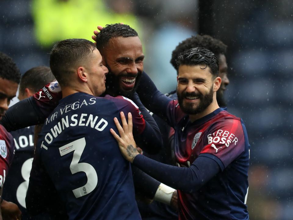 Kyle Bartley celebrates scoring against Preston with his team-mates