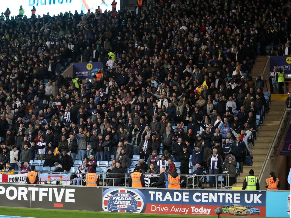 A large group of Albion fans in the away end at the CBS Arena