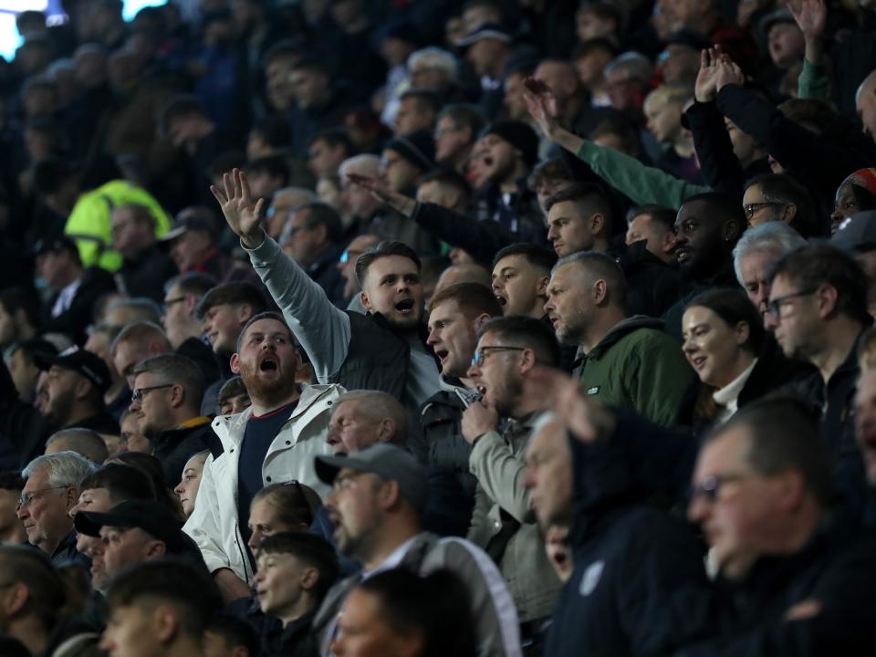 A large group of Albion fans in the away end at the CBS Arena