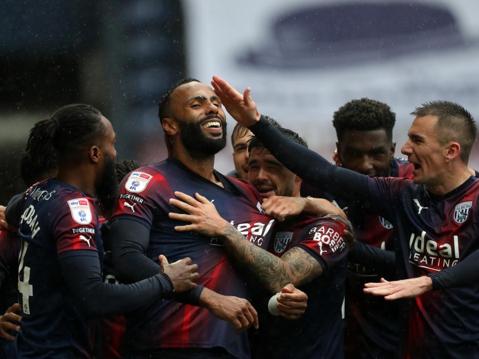 Albion players celebrate with Kyle Bartley at Preston after the defender's goal