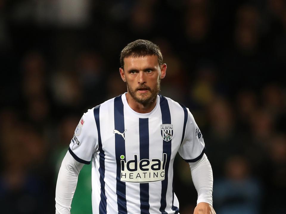 John Swift in action in the home shirt