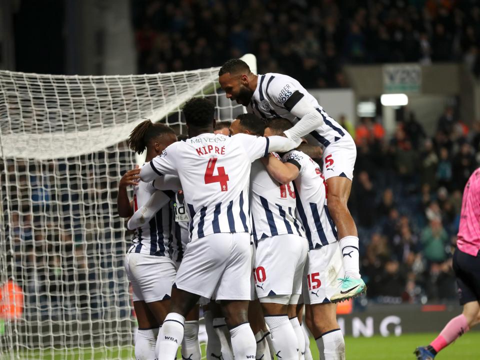 Albion celebrate their second goal against QPR