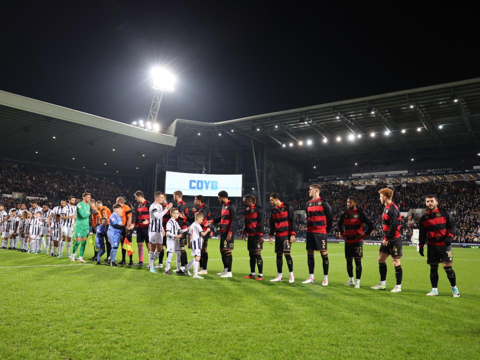 Albion and QPR players shake hands before kick-off
