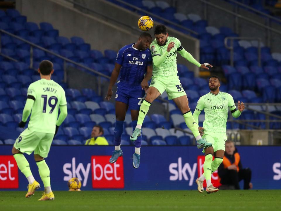 Cedric Kipre heading the ball against Cardiff